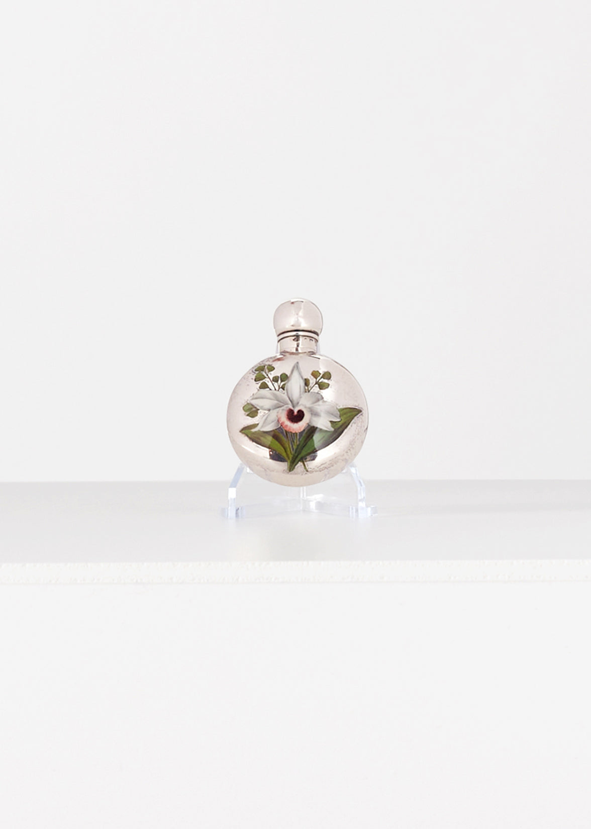 Victorian perfume bottle, silver with floral motif